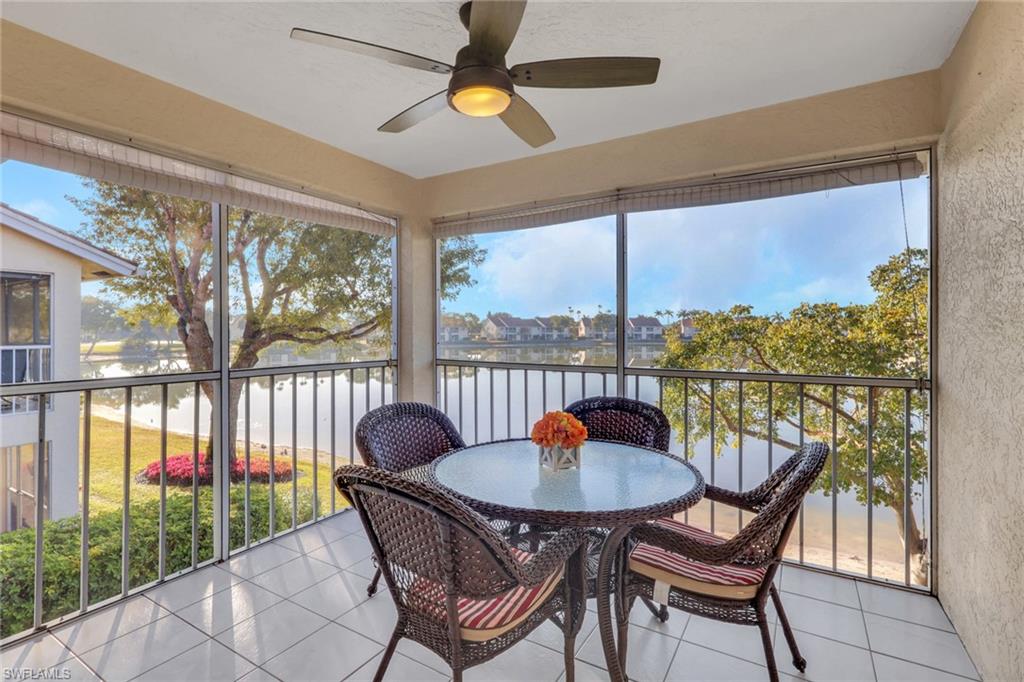 7766 Emerald Circle, Unit R203 Naples, FL 34109 - Photo 24 of 25 a view of a balcony and chairs