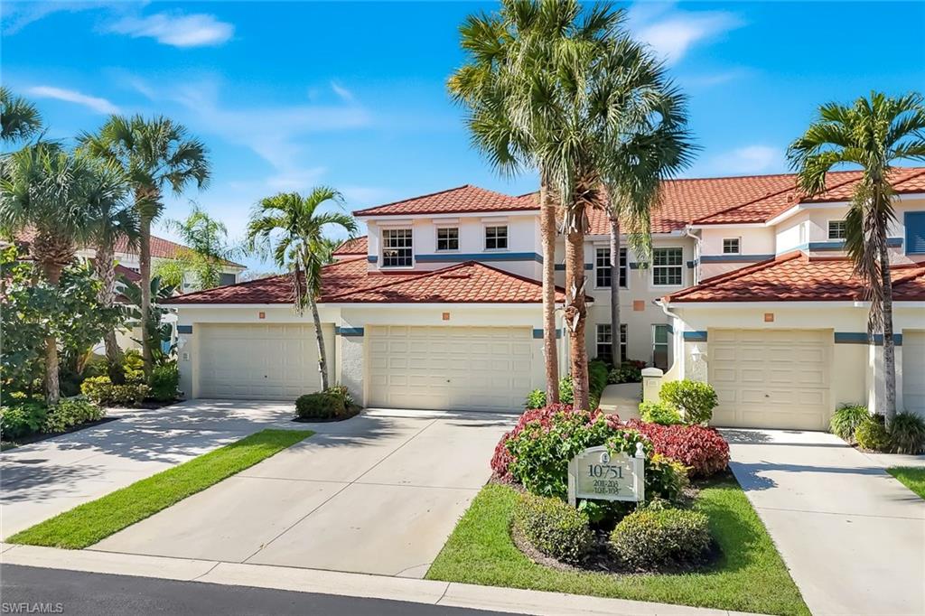 This beautiful 2nd floor end unit features a two car garage and west facing views of the lake and fountains.