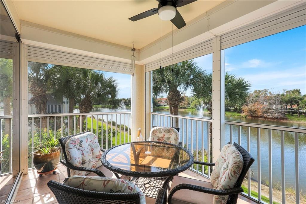 10751 Halfmoon Shoal Road, Unit 201 Estero, FL 34135 - Photo 21 of 47 Spacious patio overlooking the lake and fountains, with west facing views!