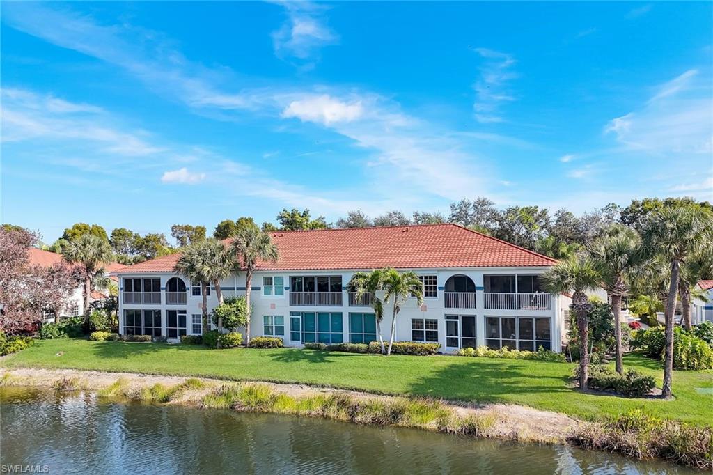 10751 Halfmoon Shoal Road, Unit 201 Estero, FL 34135 - Photo 24 of 47 Rear view of the condo