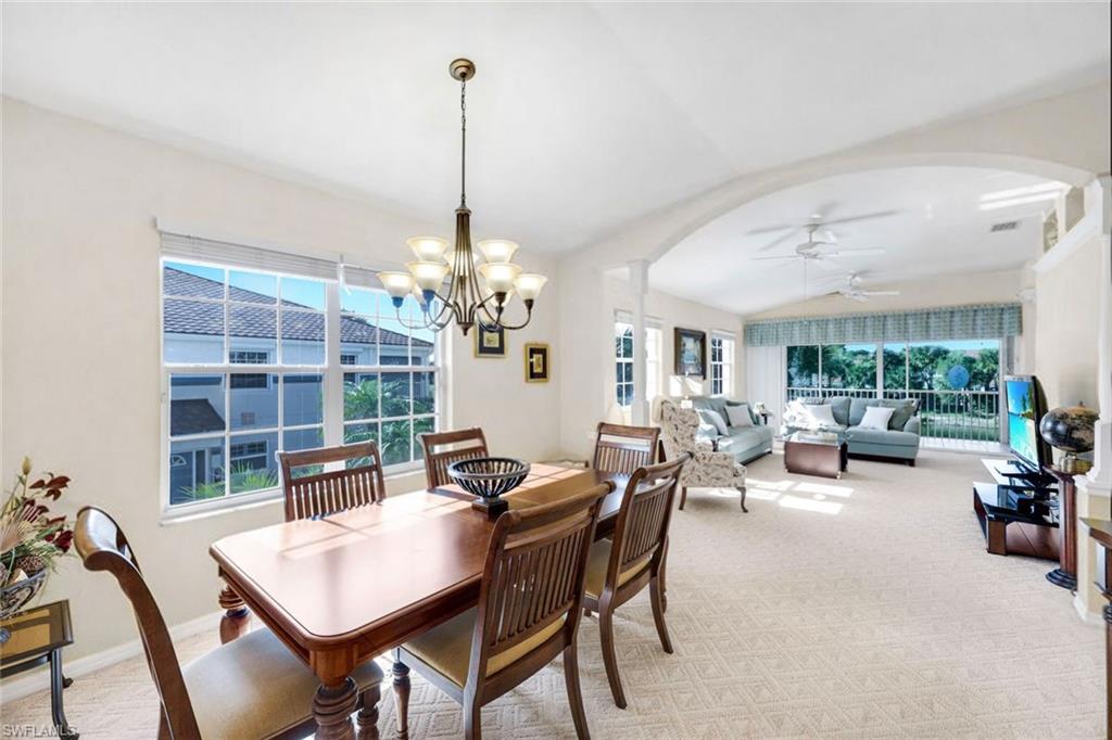 10751 Halfmoon Shoal Road, Unit 201 Estero, FL 34135 - Photo 7 of 47 (Virtual wall color change) Formal dining area with large dining table perfect for gathering with family and friends.