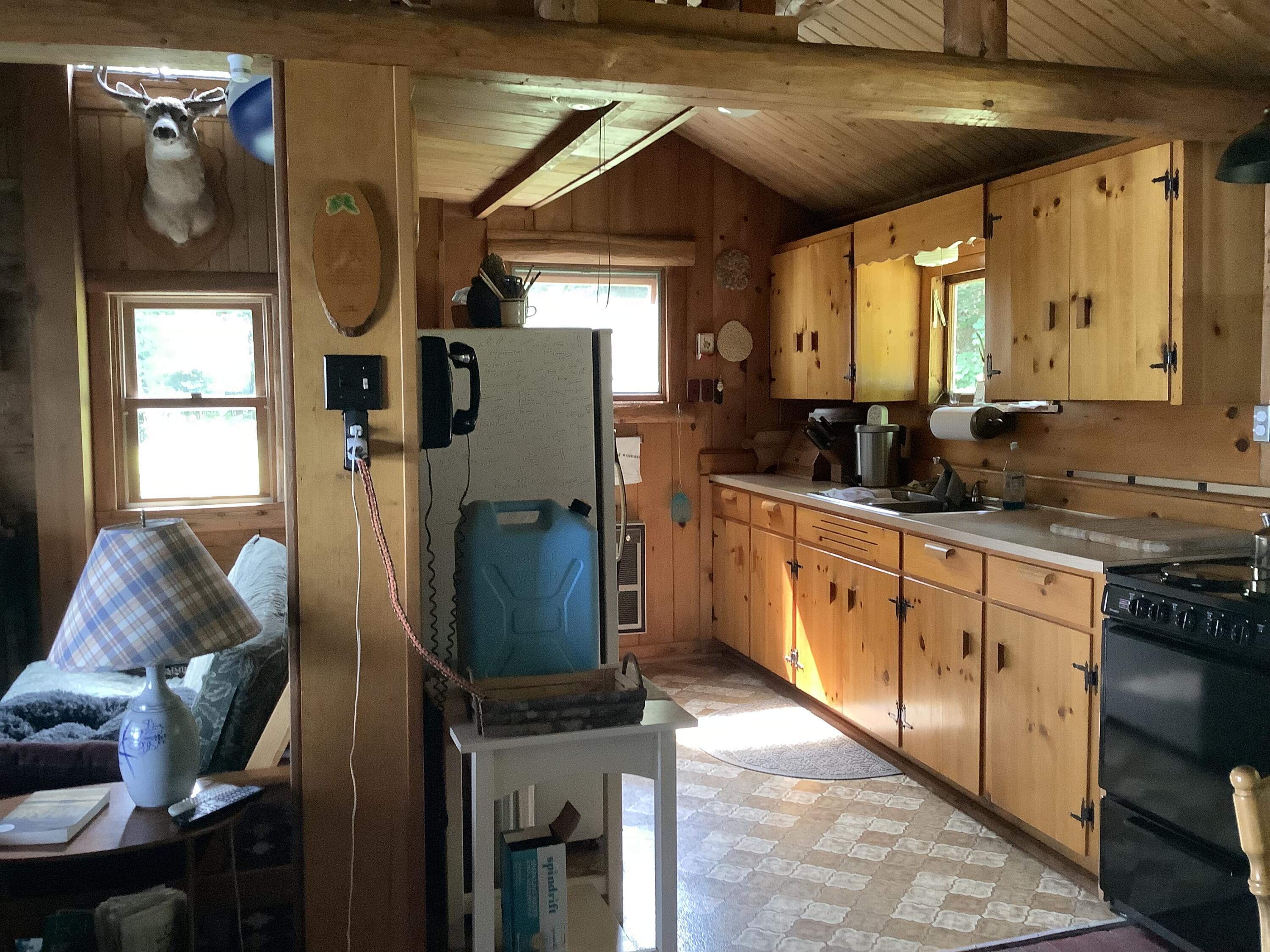 636 W Road Portage, ME 04768 - Photo 5 of 36 IMG_2685