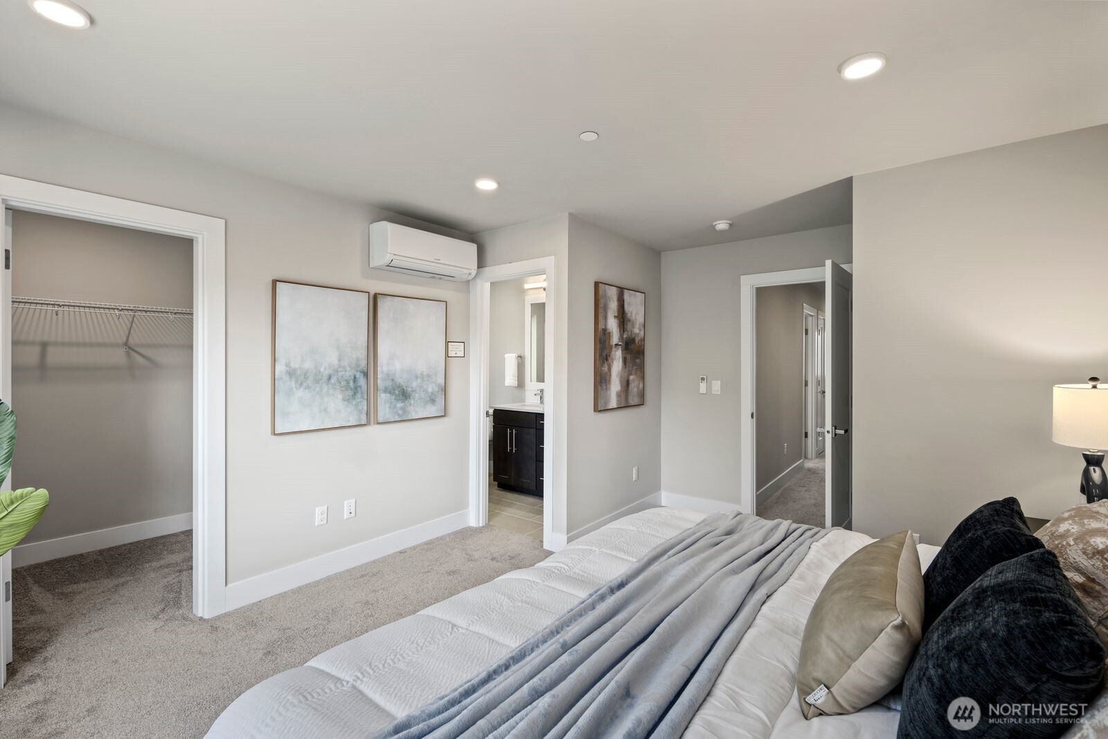 826 238th Place Southeast, Unit F Bothell, WA 98021 - Photo 13 of 39 a bedroom with a bed and a painting