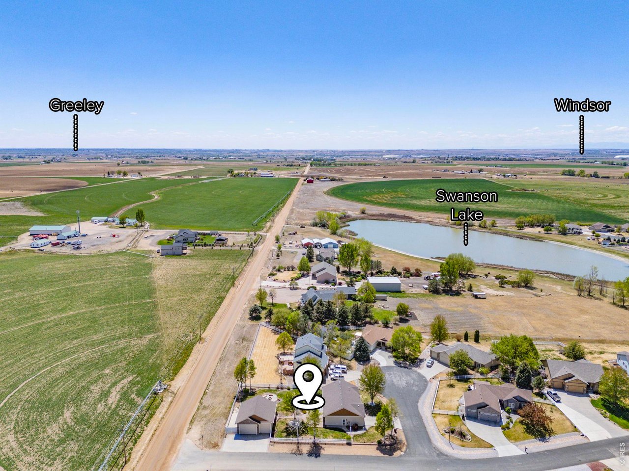 2002 Trail Ridge Drive Severance, CO 80615 - Photo 15 of 49 Situated on a private corner lot in a quiet cul-de-sac, this property backs to farm ground offering a peaceful, tucked-away feeling while still being conveniently close to town and ample amenities.