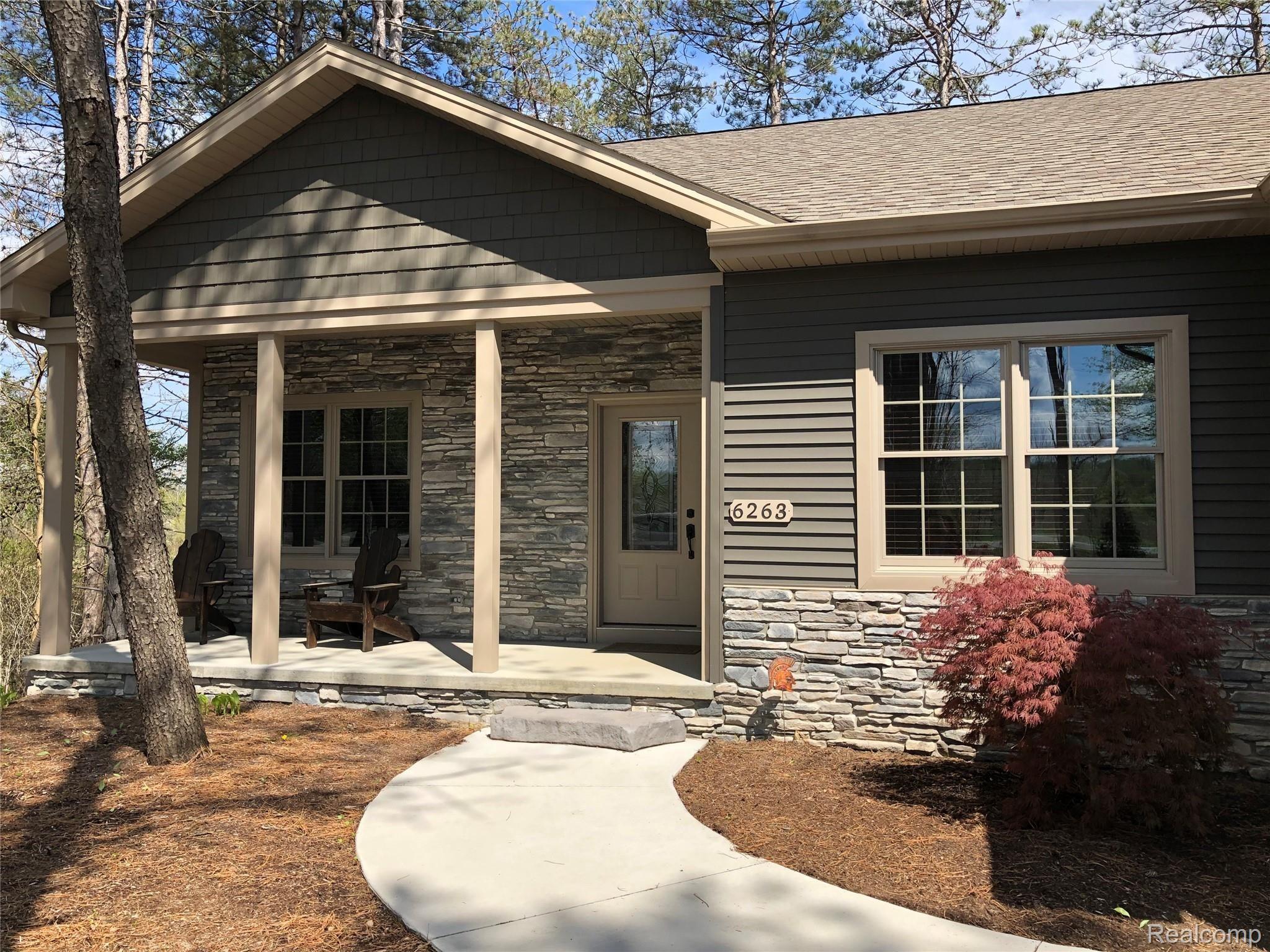 6263 General Squier Road Almont, MI 48003 - Photo 3 of 45 Covered front porch with space to relax