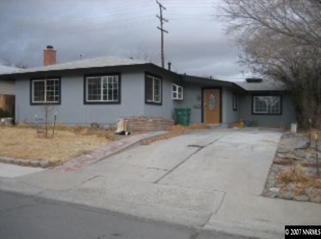 a house view with a outdoor space