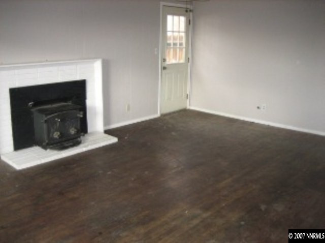 1915 Gridley Avenue Reno, NV 89503 - Photo 3 of 3 a view of empty room with window and fireplace