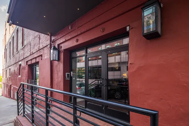 a view of a terrace with furniture