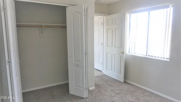 a bathroom with a granite countertop toilet a sink and bathtub