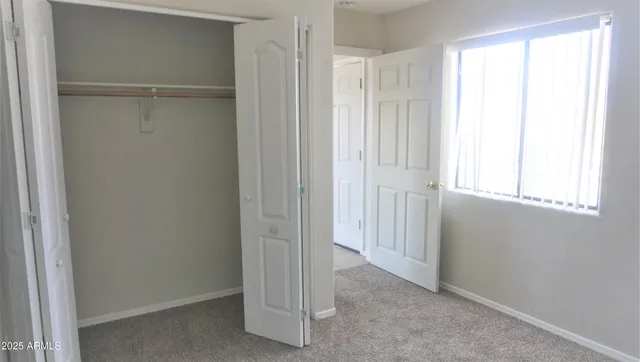 a bathroom with a granite countertop toilet a sink and bathtub