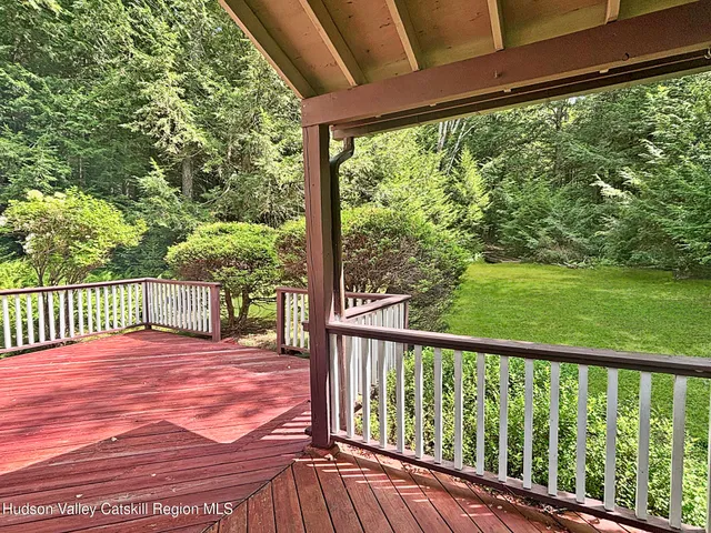 a view of a trees with a yard