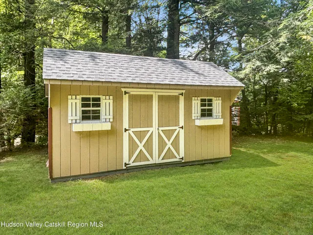 a view of lake with green space