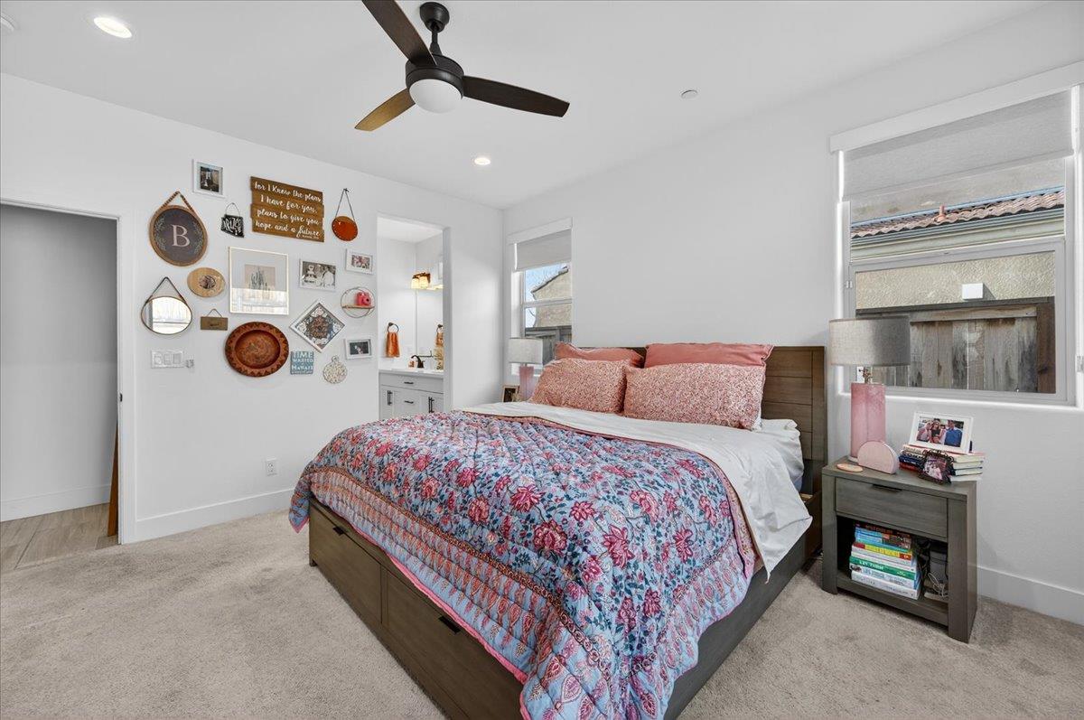 4593 Orchard Hills Road Madera, CA 93636 - Photo 17 of 25 a bedroom with bed and a window