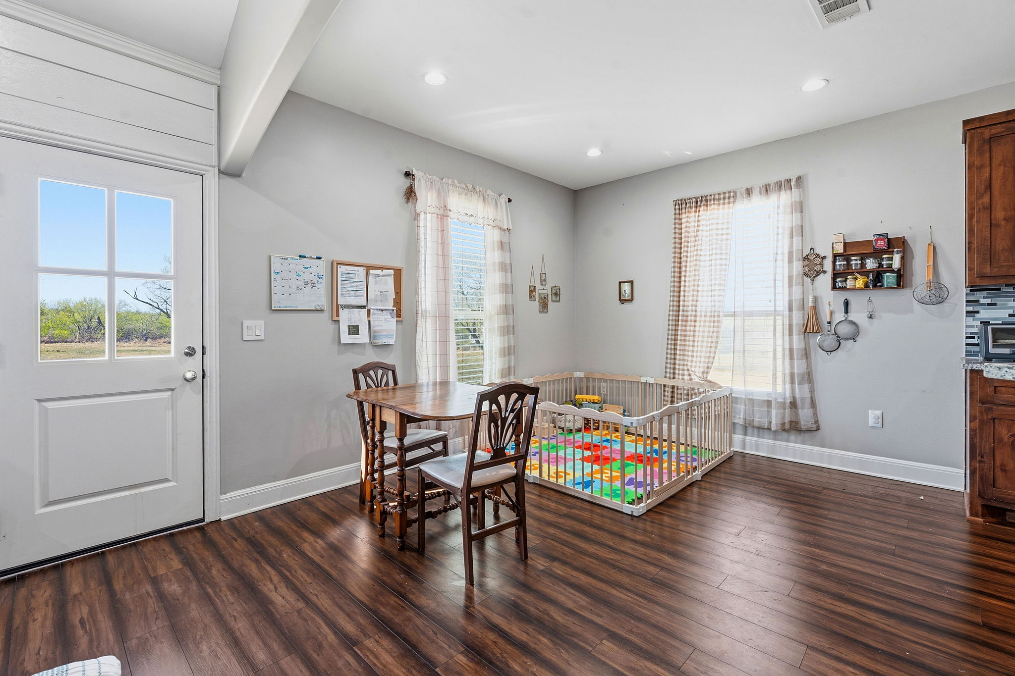 574 Highland Ranch Way Dale, TX 78616 - Photo 13 of 27 a living room with furniture and wooden floor