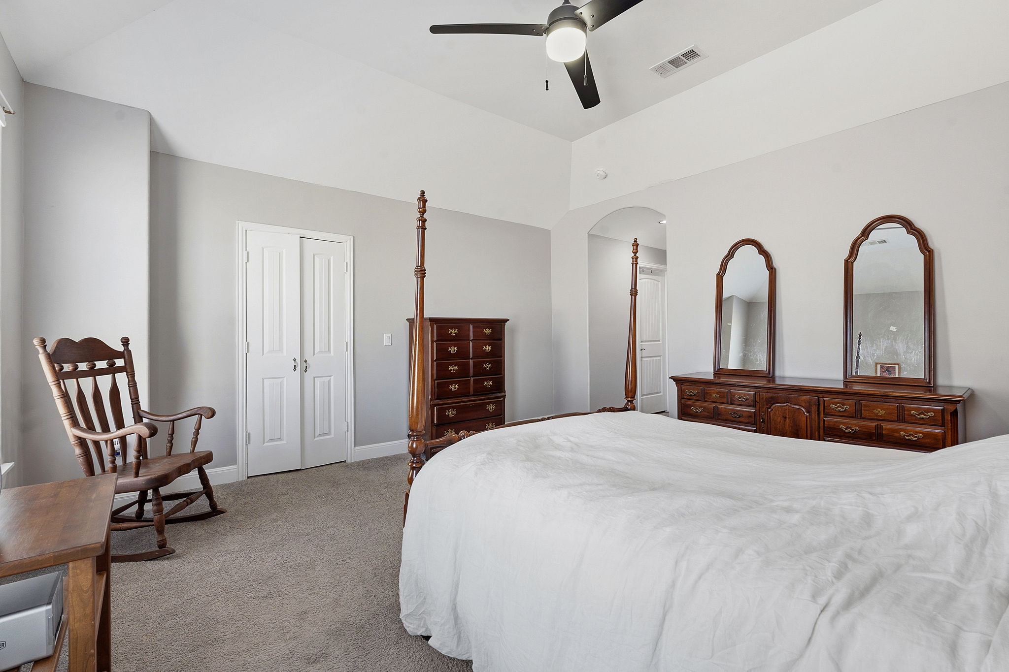 574 Highland Ranch Way Dale, TX 78616 - Photo 16 of 27 a bedroom with a bed and a chair