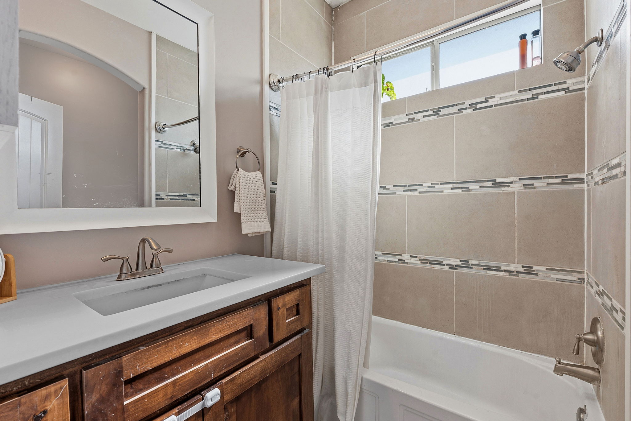 574 Highland Ranch Way Dale, TX 78616 - Photo 17 of 27 a bathroom with a sink and a mirror