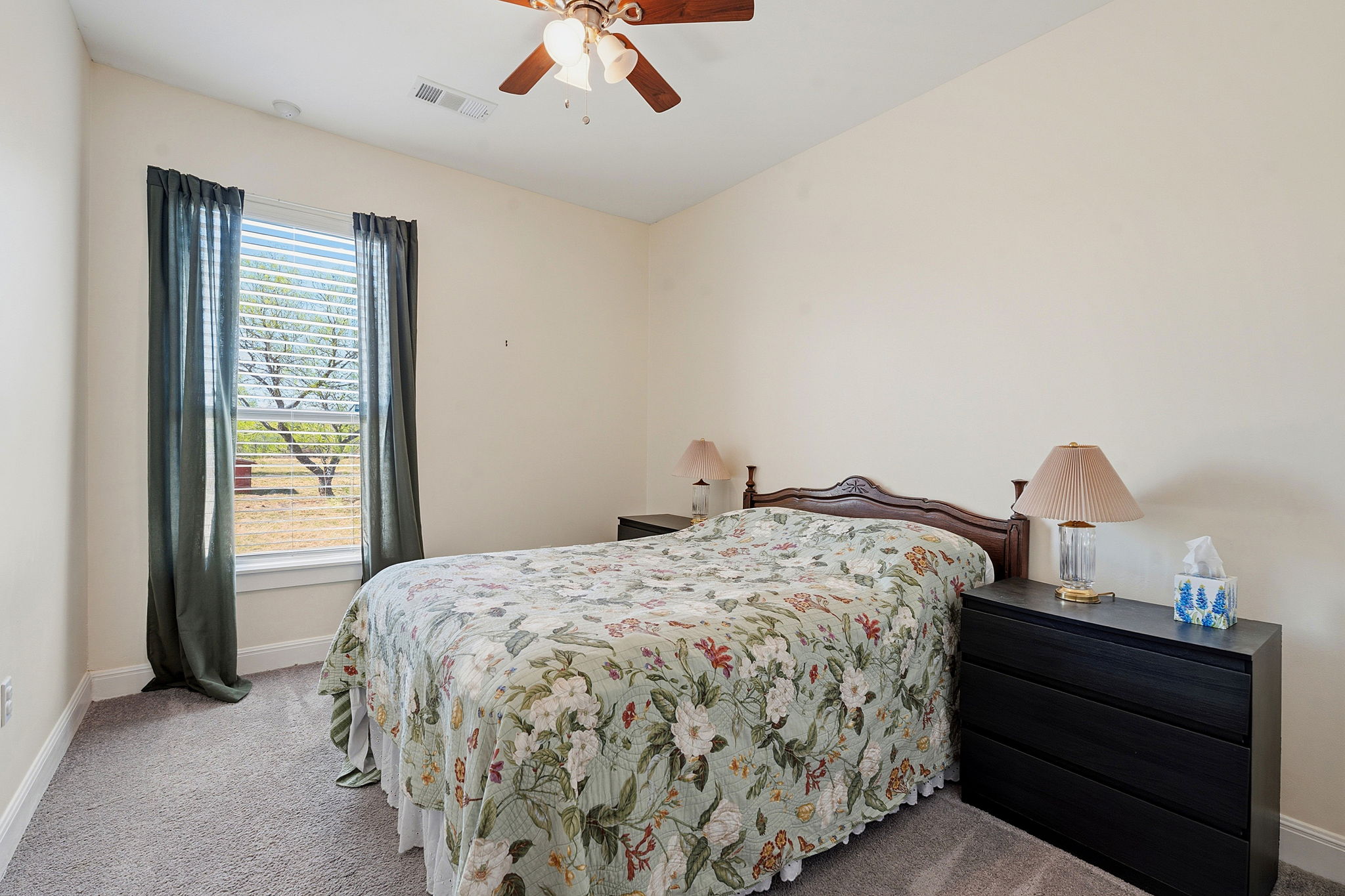 574 Highland Ranch Way Dale, TX 78616 - Photo 19 of 27 a bedroom with a bed and window