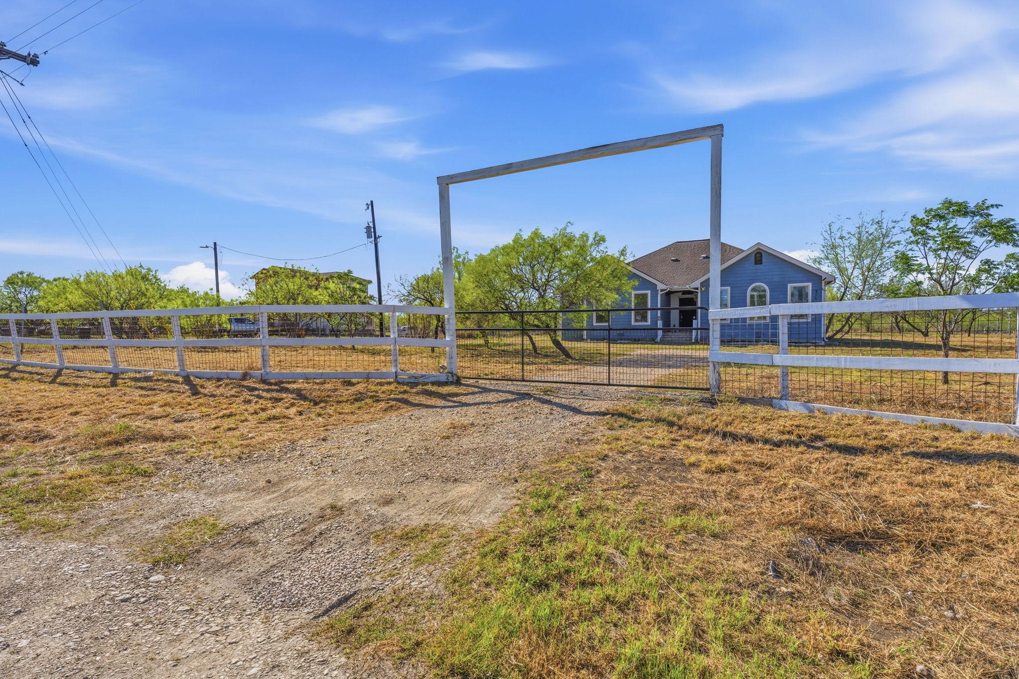 574 Highland Ranch Way Dale, TX 78616 - Photo 2 of 27 a view of a backyard