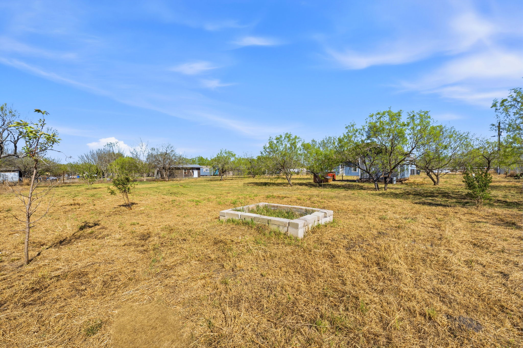 574 Highland Ranch Way Dale, TX 78616 - Photo 23 of 27 a view of a lake with a big yard