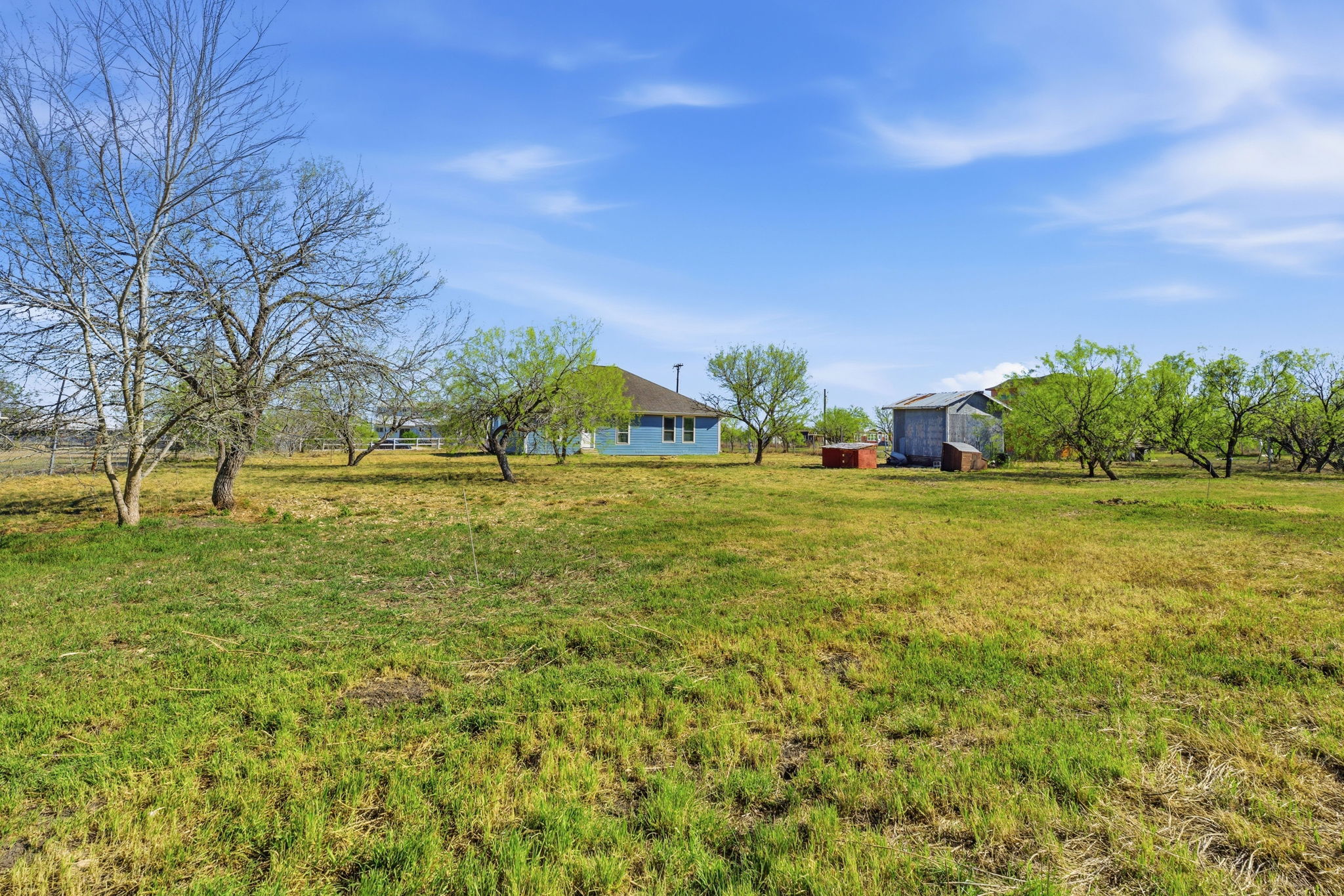 574 Highland Ranch Way Dale, TX 78616 - Photo 24 of 27 a view of outdoor space with garden and trees