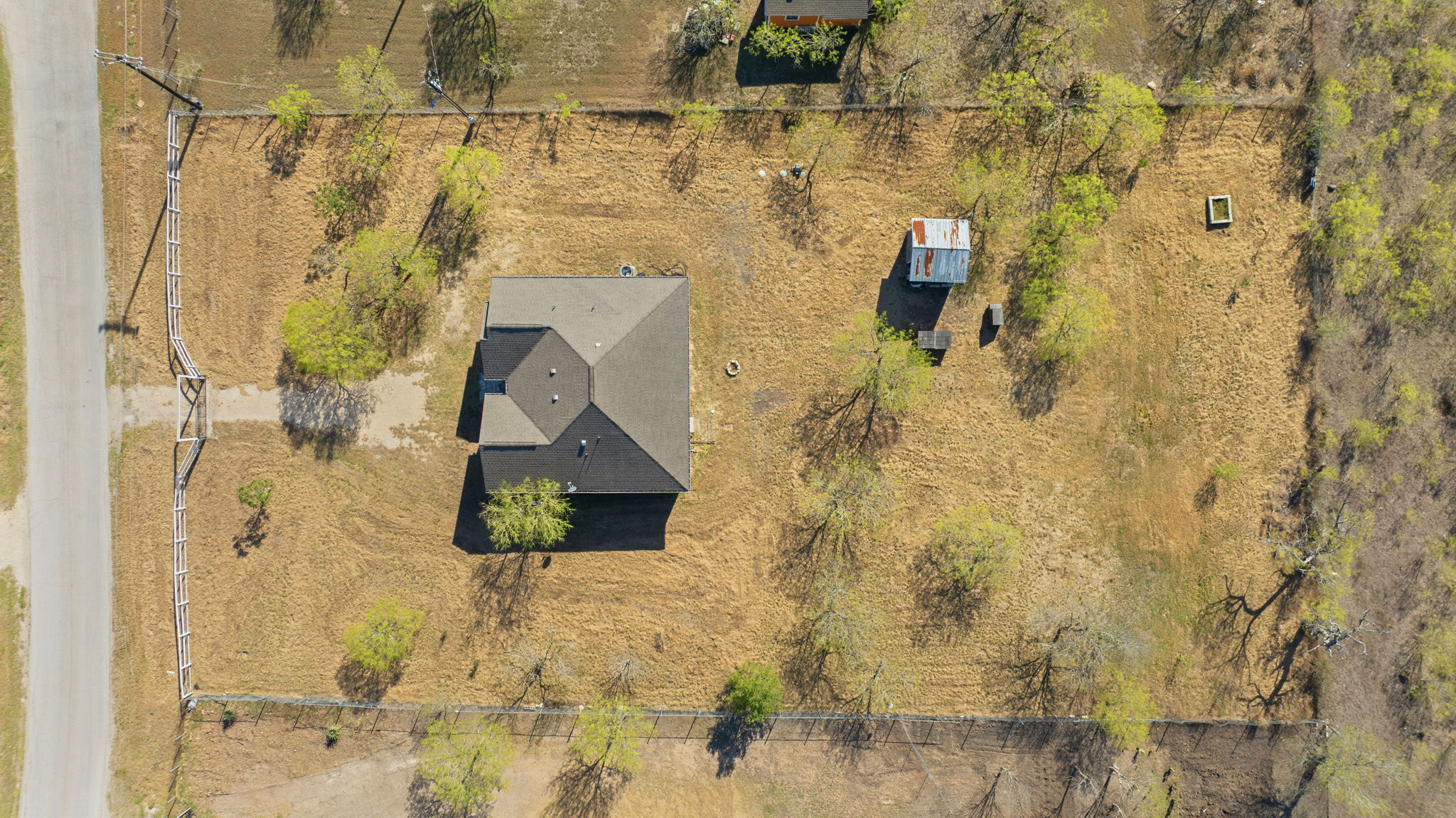 574 Highland Ranch Way Dale, TX 78616 - Photo 25 of 27 a bathroom with a shower