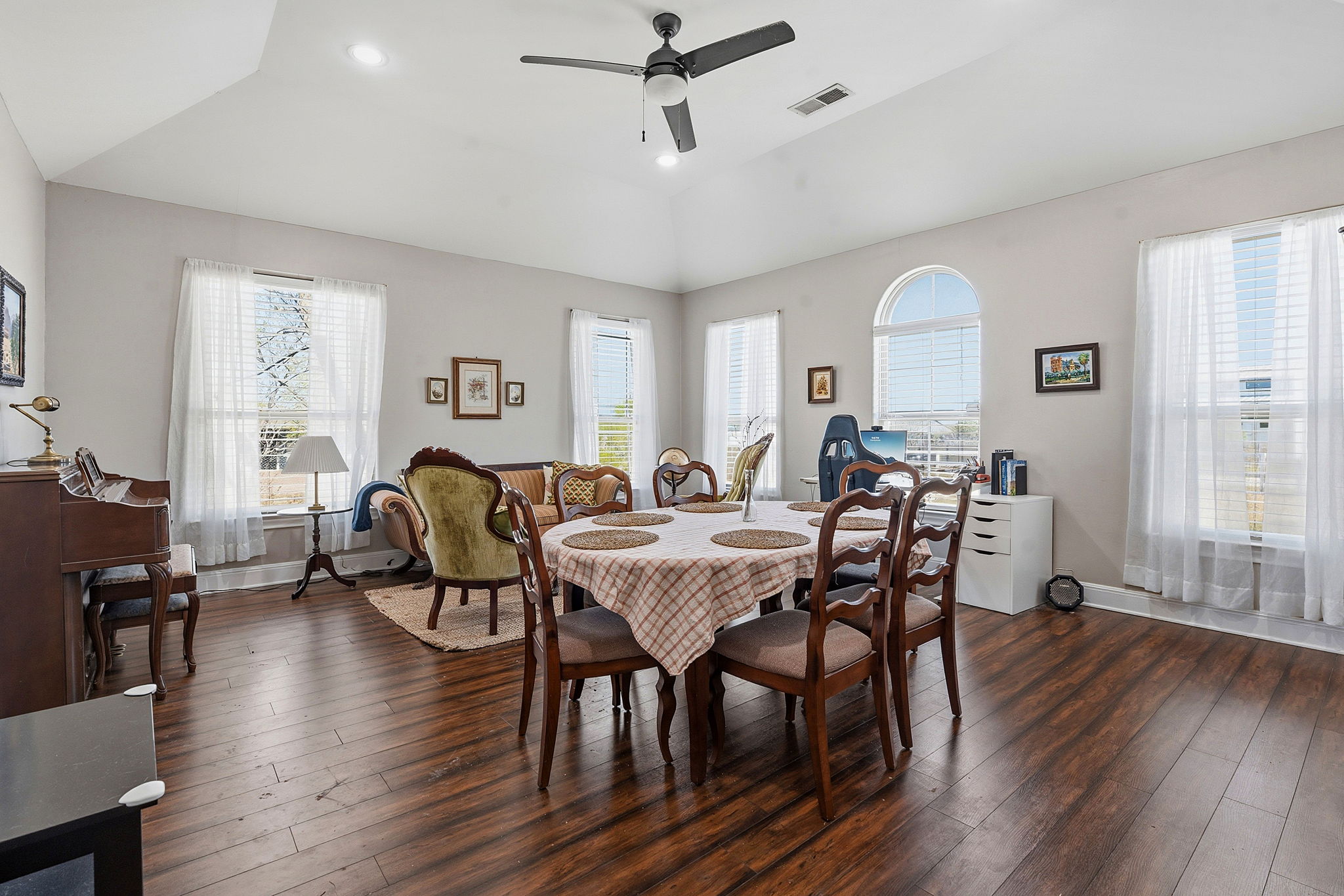 574 Highland Ranch Way Dale, TX 78616 - Photo 7 of 27 a view of a a dining room with furniture window and wooden floor