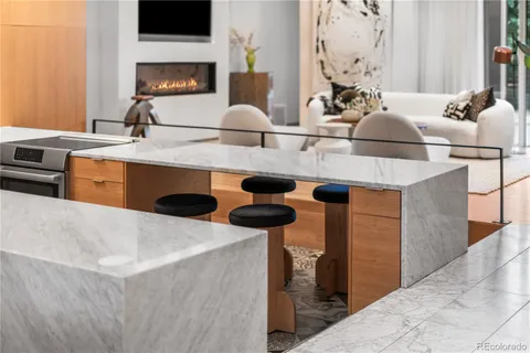 a kitchen with stainless steel appliances a sink and a granite counter tops