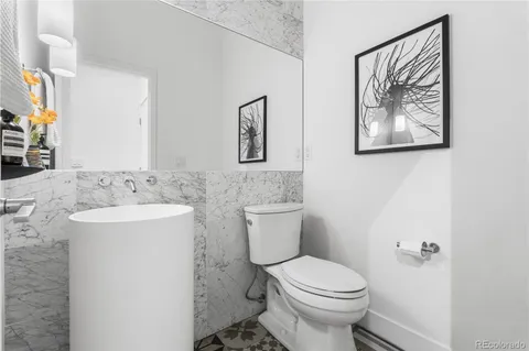 a bathroom with a sink and a toilet