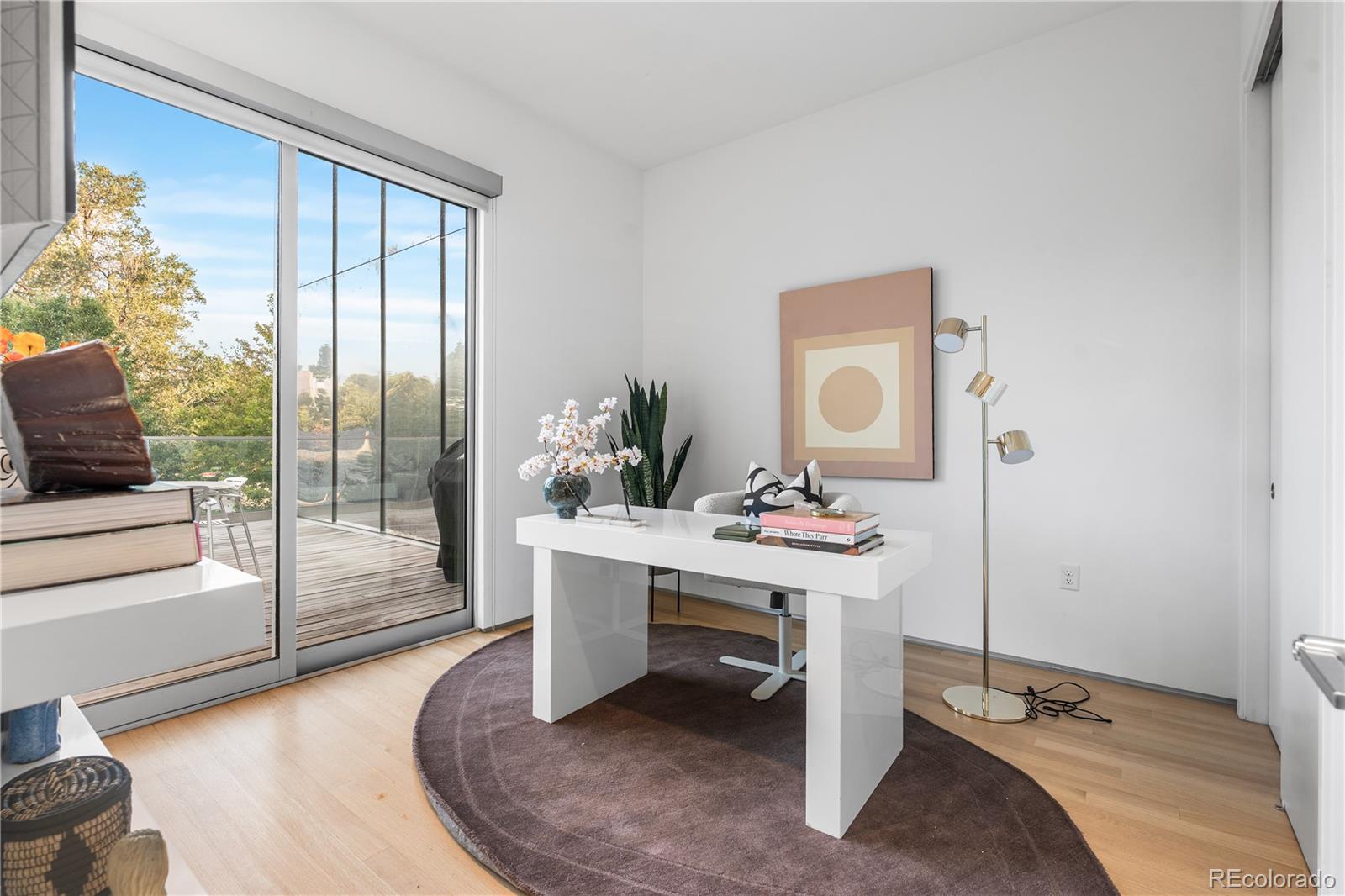 1115 West 37th Avenue Denver, CO 80211 - Photo 37 of 50 a workspace with furniture and window