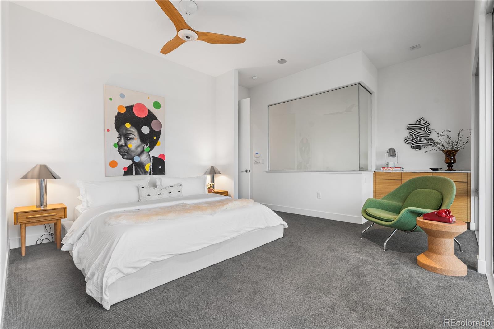 1115 West 37th Avenue Denver, CO 80211 - Photo 42 of 50 a bedroom with a bed and a couch