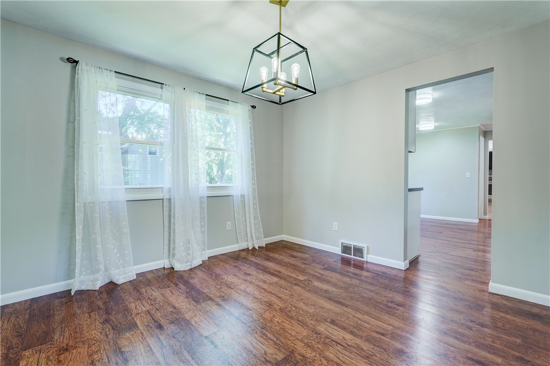 212 Hollybrook Road Sweden, NY 14420 - Photo 8 of 39 Spacious dining room! Updated light fixture.