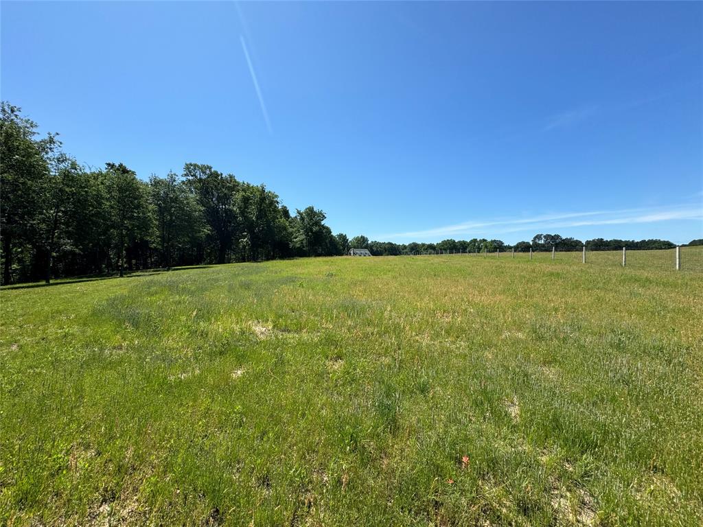 0 Pine Ridge Court Athens, TX 75752 - Photo 15 of 22 a view of a field with an ocean