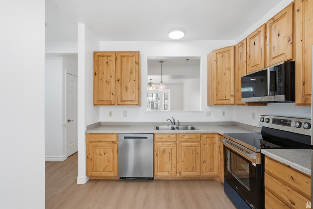 793 North 150 E Street Springville, UT 84663 - Photo 9 of 26 Kitchen featuring natural wood cabinetry, light grey countertops, stainless steel appliances, and a wood-finish floor