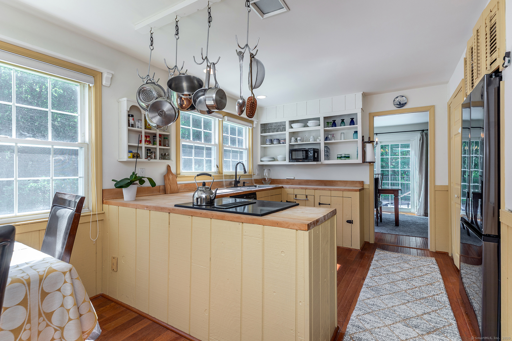 286 South Street Roxbury, CT 06783 - Photo 12 of 36 a kitchen with stainless steel appliances granite countertop a stove and cabinets