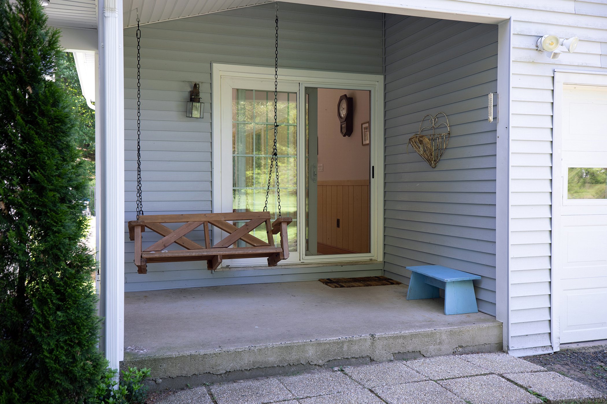 286 South Street Roxbury, CT 06783 - Photo 15 of 36 a view of a balcony with chairs and a potted plant