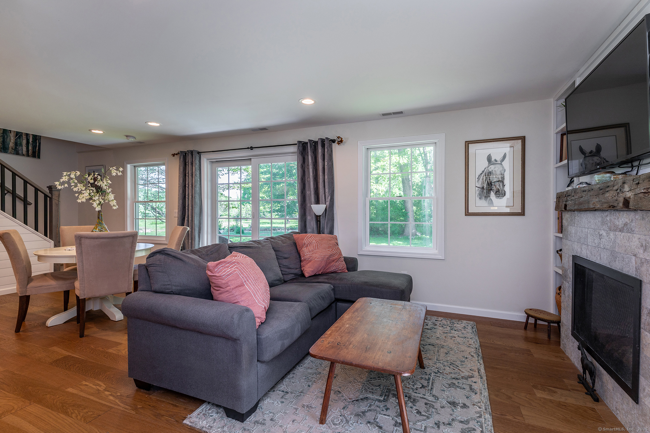 286 South Street Roxbury, CT 06783 - Photo 18 of 36 a living room with furniture and a fireplace