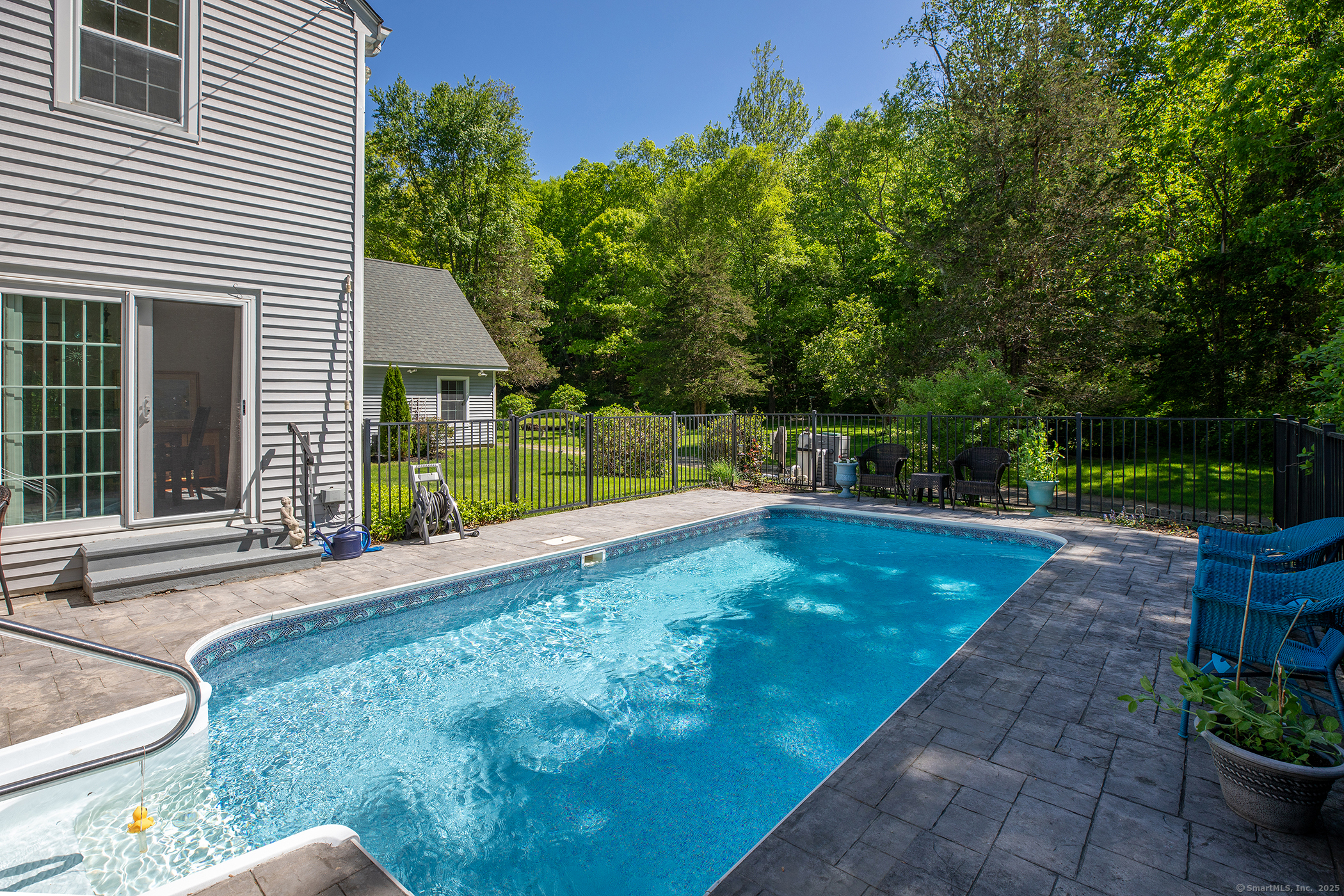 286 South Street Roxbury, CT 06783 - Photo 3 of 36 a view of a backyard with a garden and plants