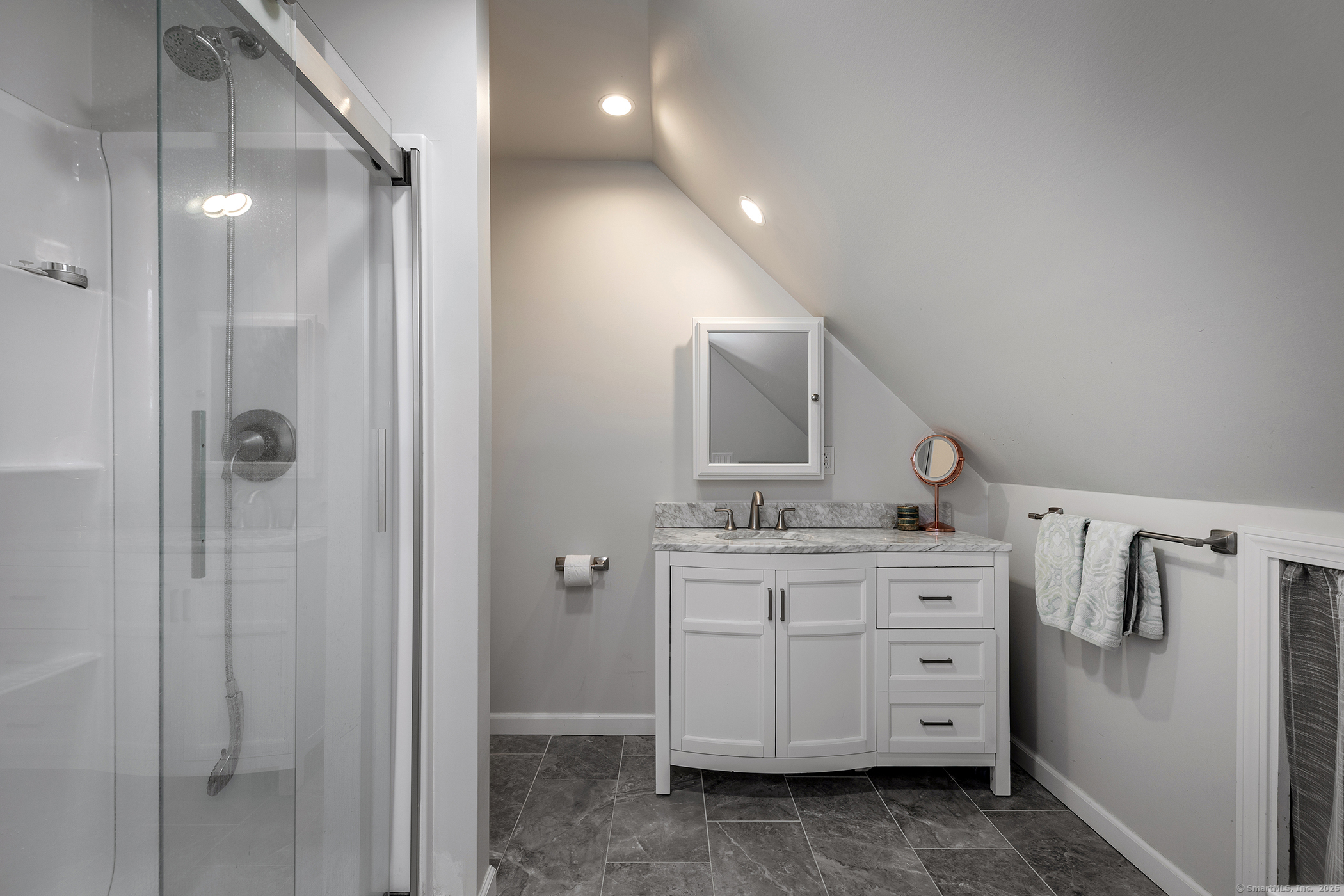 286 South Street Roxbury, CT 06783 - Photo 31 of 36 a bathroom with a double vanity sink toilet and mirror