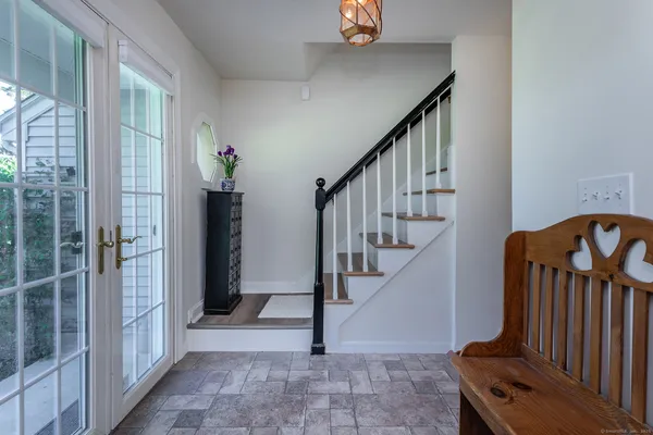 a view of an entryway with staircase