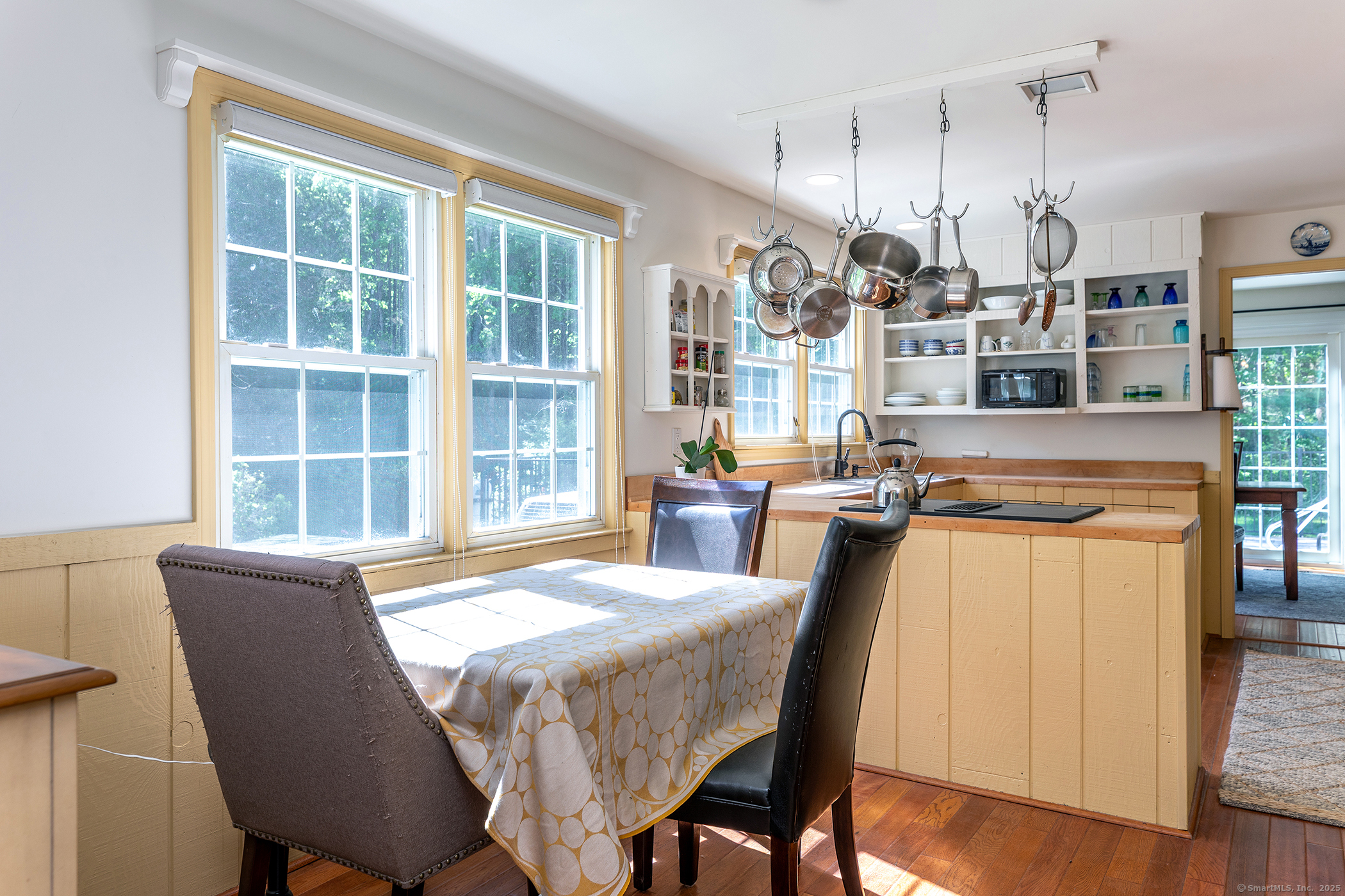 286 South Street Roxbury, CT 06783 - Photo 6 of 36 a view of a dining room with furniture window and wooden floor