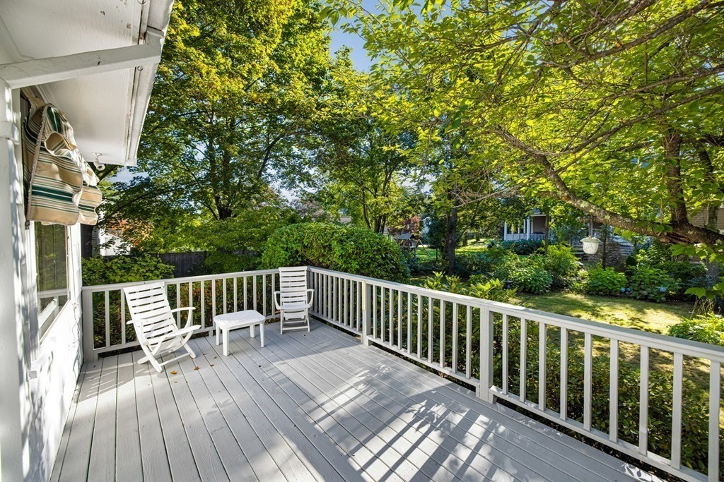 15 Hutchinson Road Lexington, MA 02421 - Photo 20 of 26 a view of backyard with deck and outdoor seating