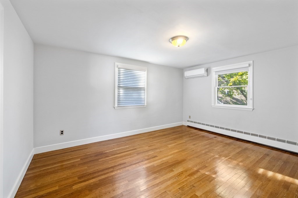 15 Hutchinson Road Lexington, MA 02421 - Photo 8 of 26 a view of an empty room with a window