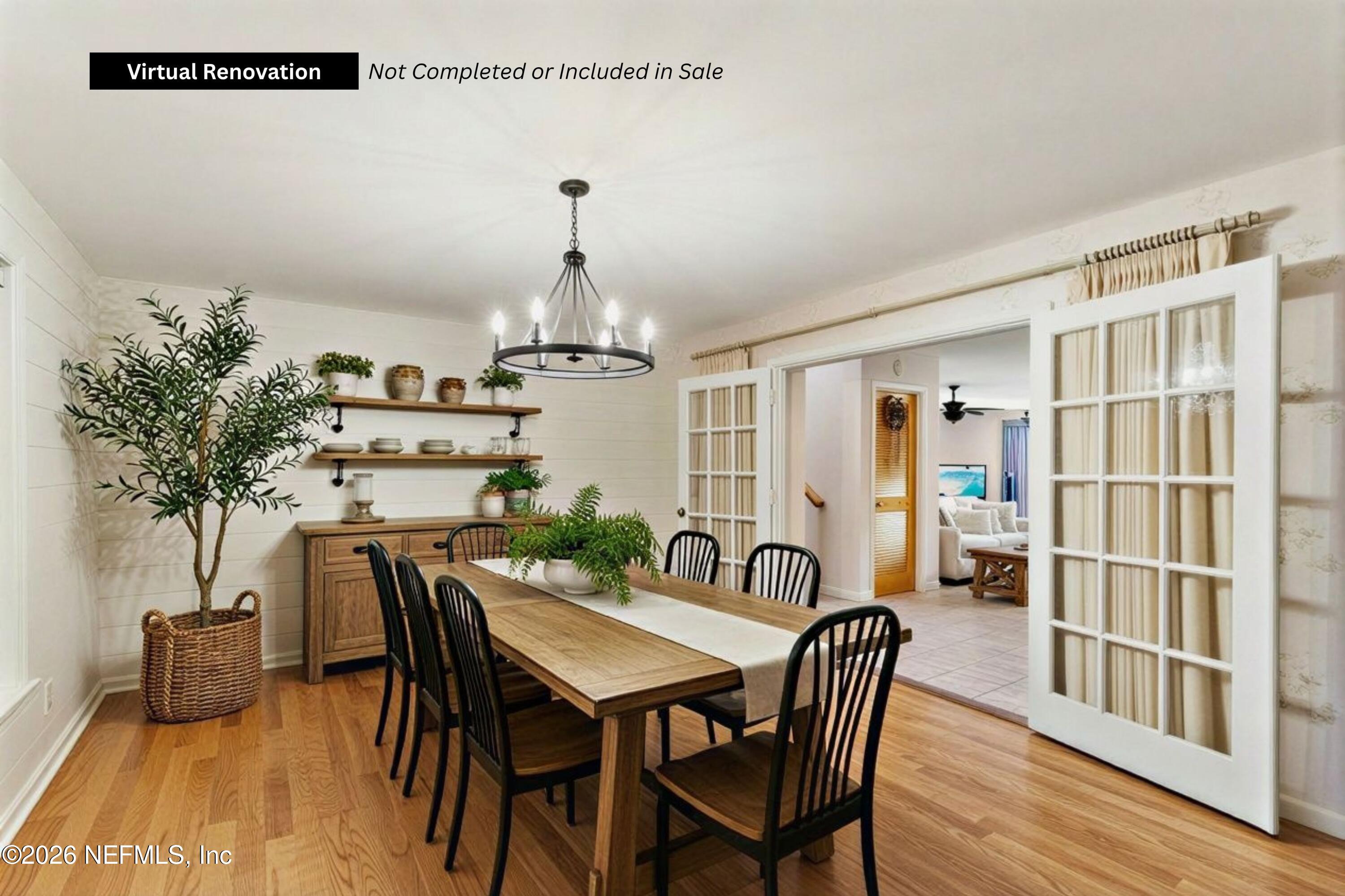 2634 Joe Ashton Road St. Augustine, FL 32092 - Photo 15 of 49 a view of a dining room with furniture and wooden floor