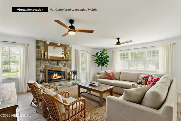 a kitchen with stainless steel appliances granite countertop a sink table and chairs