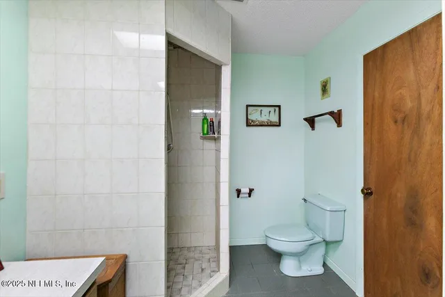 a bathroom with a toilet