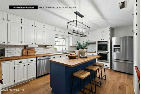 a bedroom with bed and a window