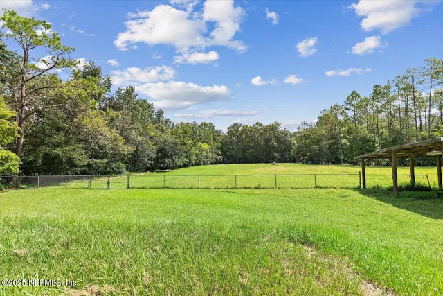 a view of outdoor space and yard