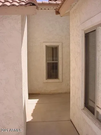 a view of a door in front of a house