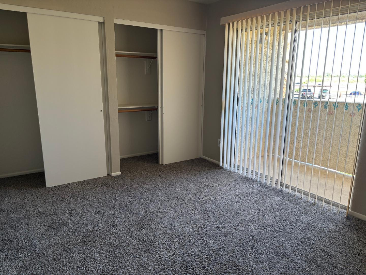 12123 West Bell Road, Unit 225 Surprise, AZ 85378 - Photo 11 of 12 an empty room with windows