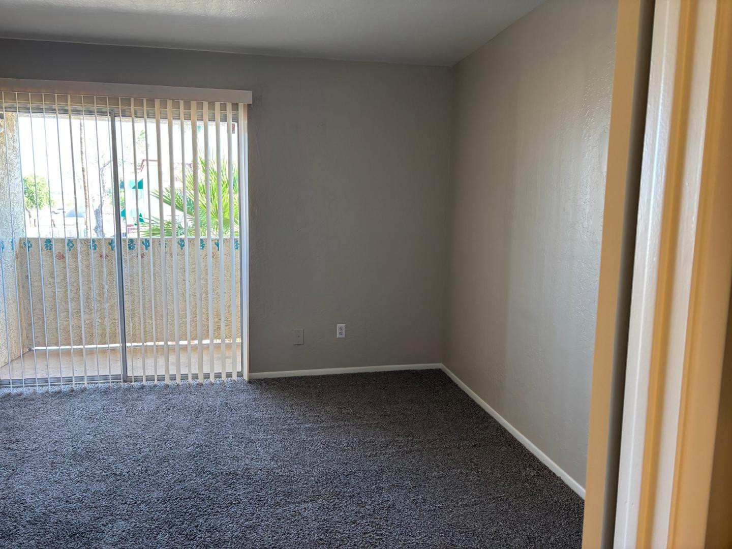 12123 West Bell Road, Unit 225 Surprise, AZ 85378 - Photo 12 of 12 a view of an empty room with a window